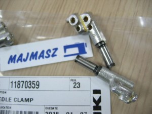Część JUKI nr. kat. 11870359 / NEEDLE CLAMP
