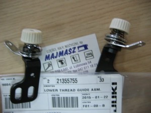 Część JUKI nr. kat. 21355755 / LOWER THREAD GUIDE ASM.
