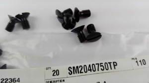 Część JUKI nr. kat. SM2040750TP / SCREW M4 L=7.4