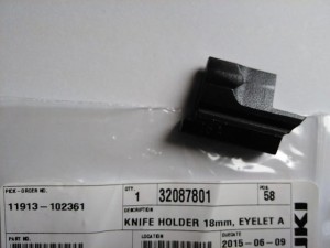 Część JUKI nr. kat. 32087801 / KNIFE HOLDER 18mm, EYELET A