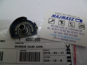 Część JUKI nr. kat. 40003895 / BĘBENEK POWIĘKSZONY PODWIJARKA / BOBBIN CASE ASM.