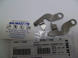 Część JUKI nr. kat. B24067710A0 / NÓŻ DOLNY DO DZIURKARKI LBH / BOBBIN THREAD TRIMMER BLADE ASM.