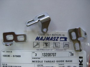 Część JUKI nr. kat. 13208707 / NEEDLE THREAD GUIDE BASE